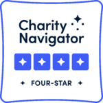 Charity Navigator four star logo: A square with rounded ends, four purple stars, and "Charity Navigator" at the top.